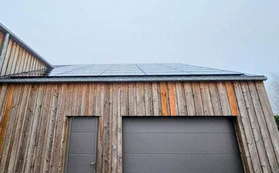 Farm building with photovoltaic panels on the roof
